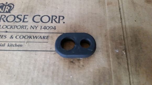Evo X grommet for ACD reservior to pass through trunk floor.