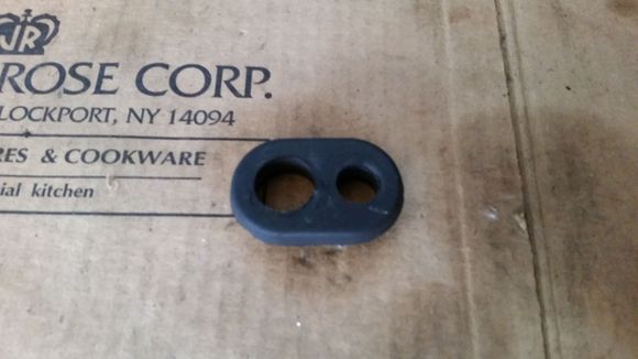 Evo X grommet for ACD reservior to pass through trunk floor.