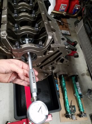 Measuring main bores with bearings in place using dial bore gauge