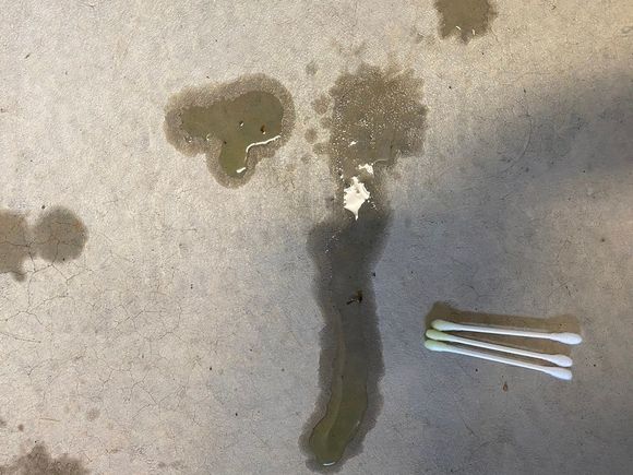 ^Recently my relative noticed that my Evo X has been leaking fluid onto the garage floor. After examining, it is the lime green Prestone coolant that I use in my Evo.