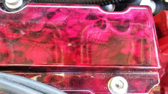 Shaved, and powder coated valve cover with hydrographics.