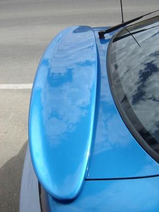 Wing, showing planform.
This is a wing from a 1st-gen Neon, and I think it fits the S13 better than the car it came from.
From above, the shape reminds me of the wing on a Spitfire fighter plane