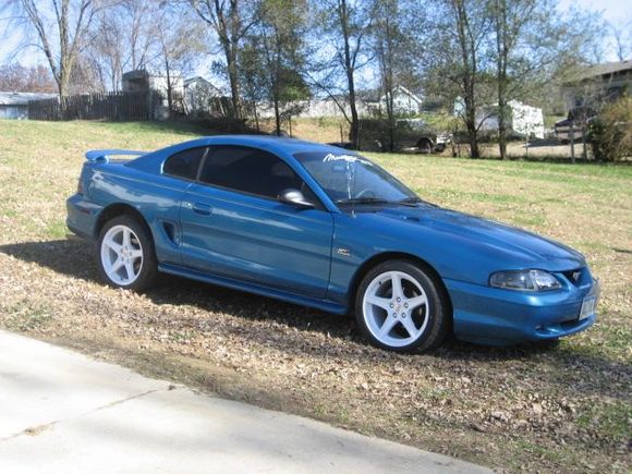 1994 Ford Mustang Gt 302 V8 :) teal(rare color-changes colors in the light)
Converted black/gray interior to all factory ford black(Cobra Interior basically)
Leather interior with Leather Racing Seats in the front
5 speed
3:73 gears
Cold Air Intake
18x9&quot; White Saleen Mustang Rims
Nitto NT555 275/35/r18-in the back
Nitto NT555 245/40/r18-in the front
Black Headlights and corners
HID Bulbs
20% window tint
2008 Apline Cd Player
Under 100k
Mac Off Road Xpipe(No Cats!!)
FlowMaster 40 series Mufflers
King Cobra Clutch
MSD Cap,rotors,wires

MUCH More to come!