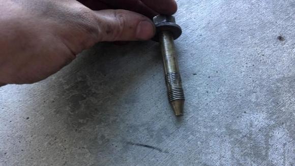 Ball joint bolt got stripped some how and let the ball joint loose.