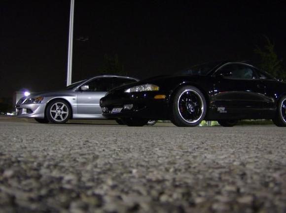 Sick night shot of my buddys 96 Talon TSI and my Evo