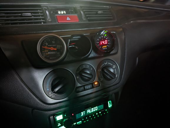 The old autometer is just halfa$$in it in there for now. Ironically the AEM fit better into the Autometer pod than the Autometer gauge.
