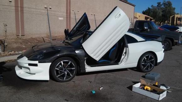 Just some of my work installing lambo doors and fabricating CF.