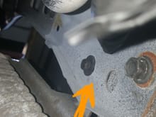 here is the other trans cooler bolt,its on a verticle center support. ground that down too. There may be more so look before bolting the core up.
