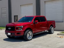 2019 ruby red XLT with a stx grill swap sitting on 22x12s wrapped on 33x12.5s