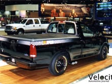 1998 Chicago auto show Nascar Edition F150 prototype. Production trucks came with exhaust exiting behind rear wheel & black painted center caps covering up the exposed lugnuts shown on the prototype. Truck shown was prepared by Roush & looks to have been likely lowered via a Roush lowering kit, which did not make it into the production trucks. Production trucks were lowered 1 inch from stock F150's via ford parts.