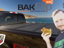 BAKFlip MX4 by Truck Hero. At the beach, Kyle often partakes of delicious drinks that come with little umbrellas in them.