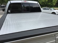 Custom fabbed 4-section diamond plate aluminum bed cover