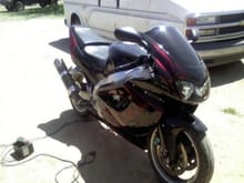 Full Custom R1 it is Black with black to blood red flames on it with a D&amp;D exhaust &amp; a bunch of other stuff tell you what this thing gets from 0-100 in about 3.5 seconds