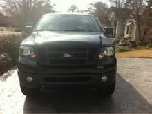 Blacked out grille, headlights, emblem, and bumpers