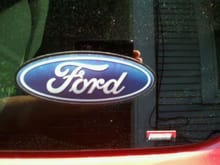 Ford emblem and Flowmaster logo (even though its straight piped)