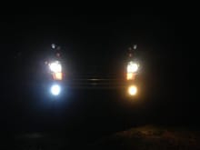 Changed out the fog lights left is the new one real life its a much closer match to factory HID's than stock light and nobody flashes me has more of a Zeon look