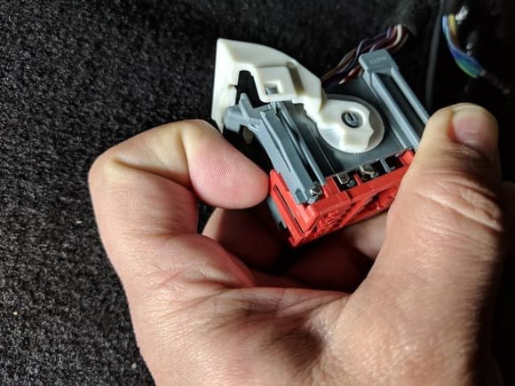 Remove Red Retaining clip with your fingernail on the BCM connector