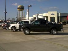 went to the dealership jus to look at trucks for shits and gigs..so i jus had to park by a new one. and i must say looks nifty with all the news ones by it