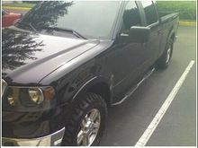 Pretty annoyed right now because my home computer wont let me upload but my work does. This is from my cell and a crappy pic but you kind of get the new idea. Blacked out heads tails emblems, tints etc...