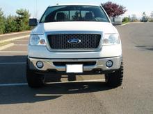Truck with 2.5" Skyjacker kit. 3" Ready Lift blocks rear.