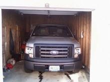 new truck just barely fits in the garage, Oil stains are from the old Bronco that used to sit here and leak the oil, lol