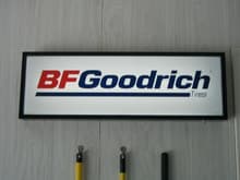 A cool BF Goodrich Tire display sign I have mounted in my garage.