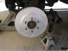 once the brake is compressed and the brake pads are in put on the new rotor
