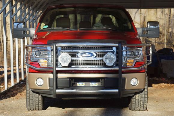 Then, added the brushguard with a set of PIAA RS600 HID driving lights, and did the '13 HID Headlight upgrade.