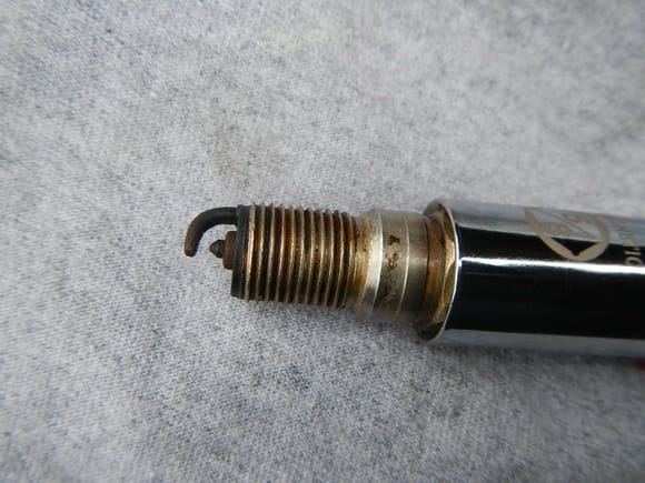 Used spark plug I removed from the Truck - 2