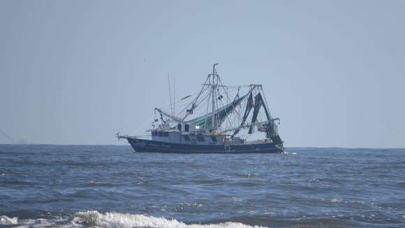 Took this pic from my truck of this shrimp trawler..not too many out yesterday.