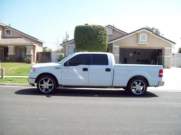 08 Ford F150 new wheel and tires with a 2 inch shacle in the back  010