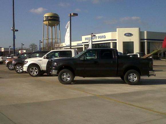 went to the dealership jus to look at trucks for shits and gigs..so i jus had to park by a new one. and i must say looks nifty with all the news ones by it