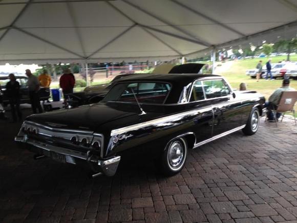 There was a nice trifecta of '62 Impalas at the show -- this first one looked great with the black paint against a red vinyl interior!