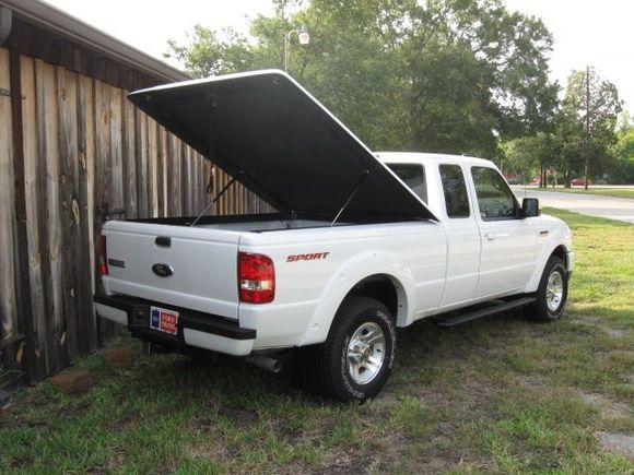 Snug Top bed cover in the open position.