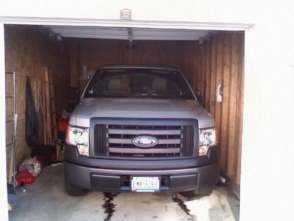 new truck just barely fits in the garage, Oil stains are from the old Bronco that used to sit here and leak the oil, lol