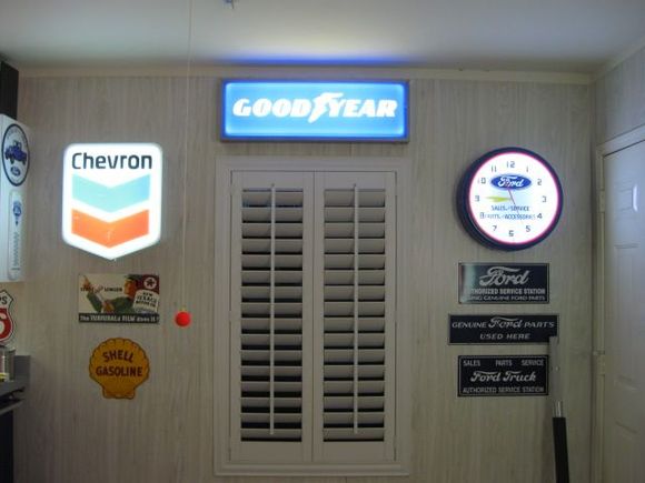 Various lighted signs as displayed in my garage.