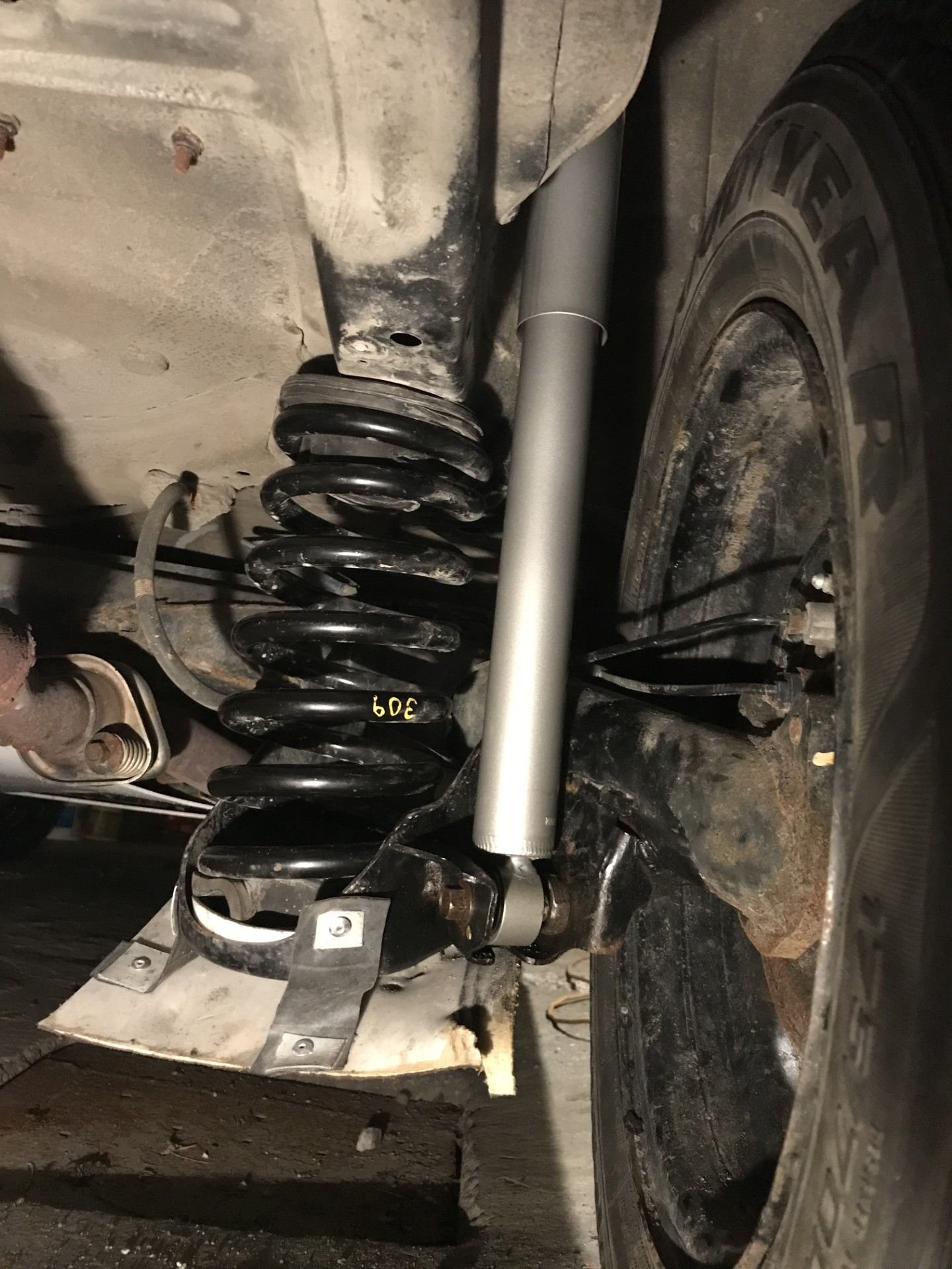 Now i run KYB KG4741 with 309 psi Moog spring (can't find the number) cut at 12 inch . It's pretty stiff and not bouncy at all . It give 2.5 inch lift . I run this setup for stage rally but it's streetable . KYB KG4741 are stiffer than Bilstein 24-025386. The shock valving and spring have to fit together in order to have a great ride . If the car is bouncy le shock valving is to weak for the spring rate .