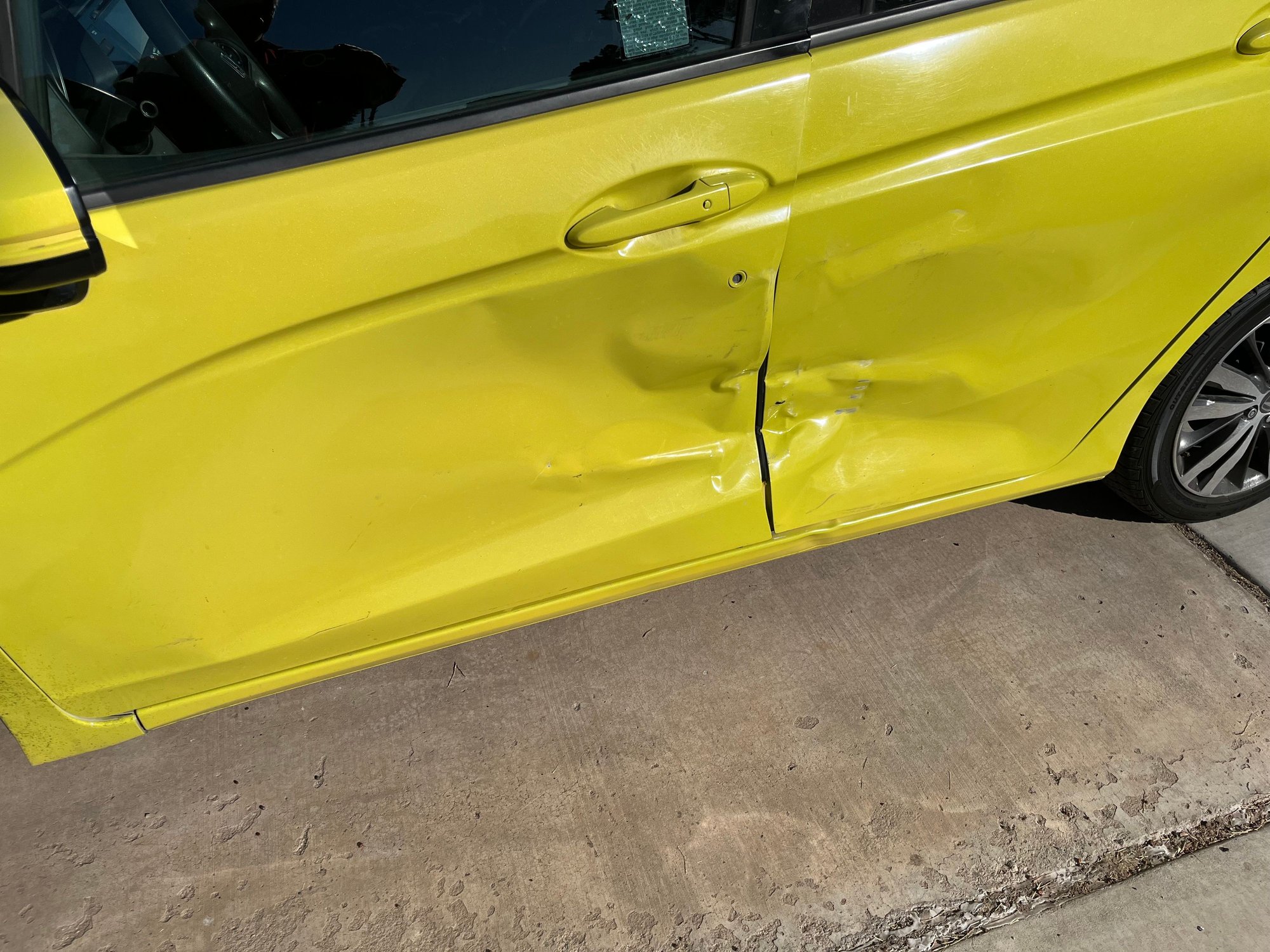 A couple months ago while my car was parked, another car ran into it and damaged both doors since that time the car has been repaired except the gas gauge either reads totally full or totally empty regardless of how much gas is actually in the tank and the low fuel light occasionally blinks even on a full tank. Can someone point me to a possible fix? 