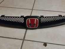 Painted the grille matte black and added the oem jdm ctr emblem