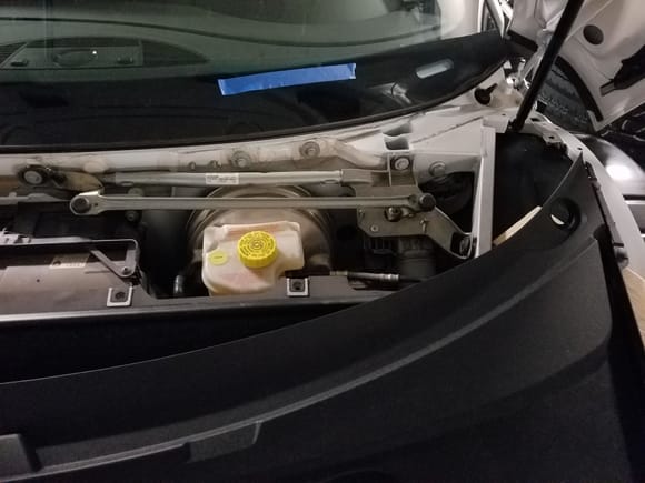 In the Audi, trim removal in trunk areaas well as wiper arm removal are necessary to access the brake fluid reservoir.  Fantastic engineering design???  Bet that all dealer's service departments are loving this!!!