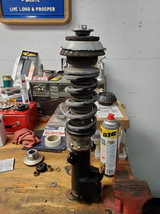 Here is my coilover as it was in the car, complete with factory cutout in the stack above...