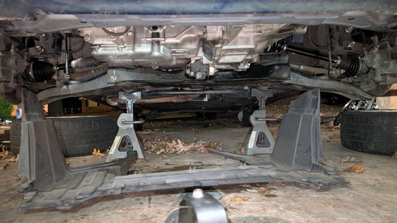 Plastic splash guard being installed prematurely..   Save this for later/last