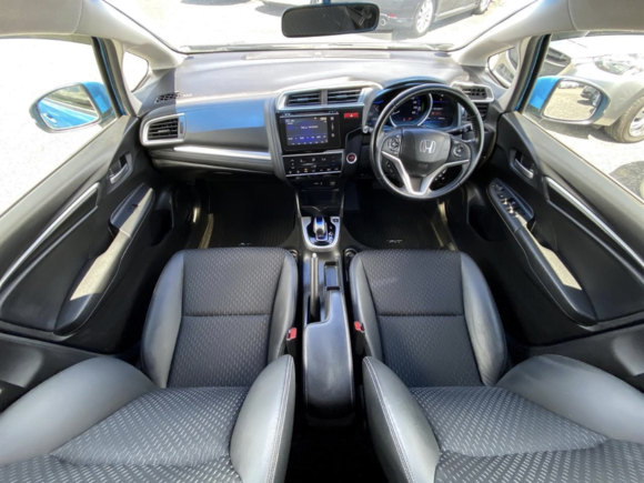 "Smart Edition" with steering wheel media controls, and L package, with half-leather seats.