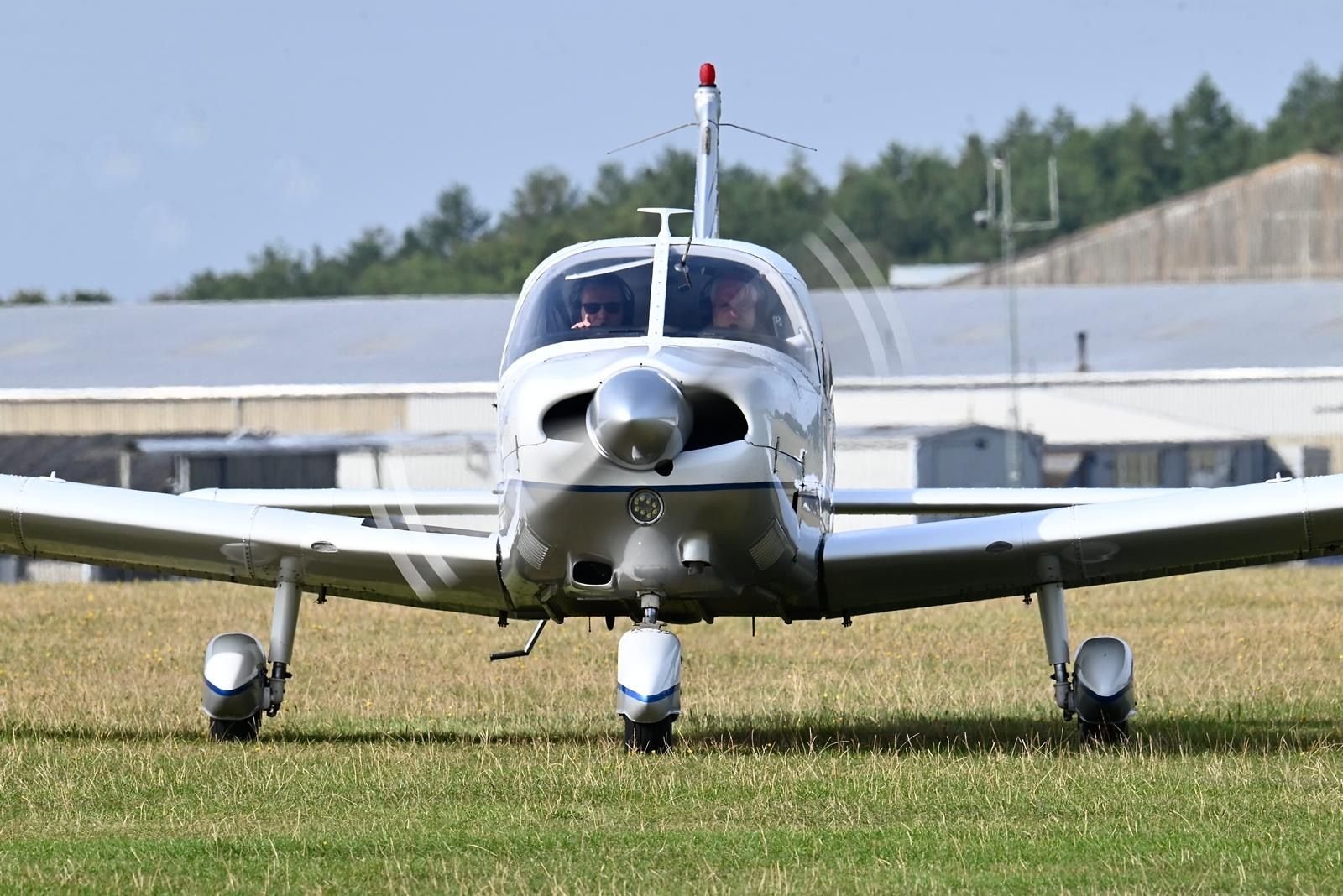 Piper PA28 Archer 2 - arriving into Lasham (QLA/EGHL). I am the person in the left of this photo, occupying the right hand seat; my flying buddy is Pilot In Command (PIC) for this flight. 