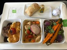 Left to right: braised pork tenderloin, Mexican chicken stew, and farro, barley, wild rice & quinoa salad