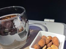 Coca Cola with Warmed Nut Ramekin. 