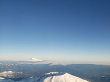 SEA PDX. Reminds me sort of like Ansel Adams' Moonrise, Hernandez NM. 

St. Helens but i dont know distant cone.