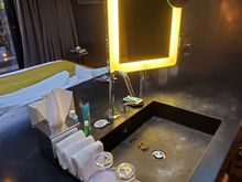 The bathroom sink. The back side is the "headboard" of the bed. The makeup light doesn't shut off on its own.