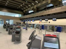 Calgary Airport Air Canada check-in area – deserted except for a few staff