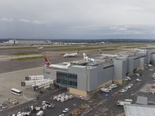 From rm 1301  T3 gates empty overnight but filled up whilst I was at breakfast. BA Airbus just rotating.